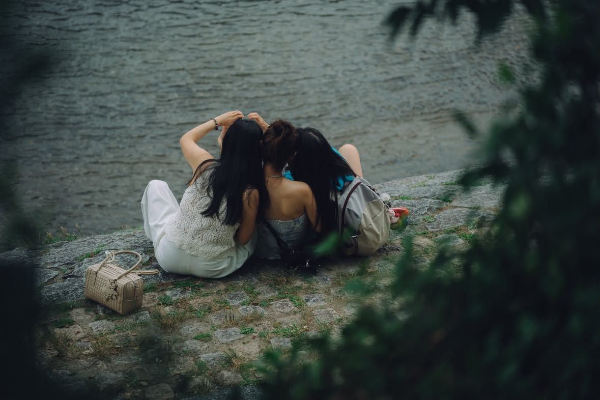 Friends on the riverbank.